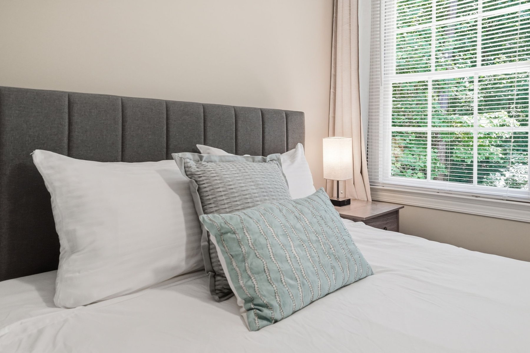 Bedroom with bed and natural light
