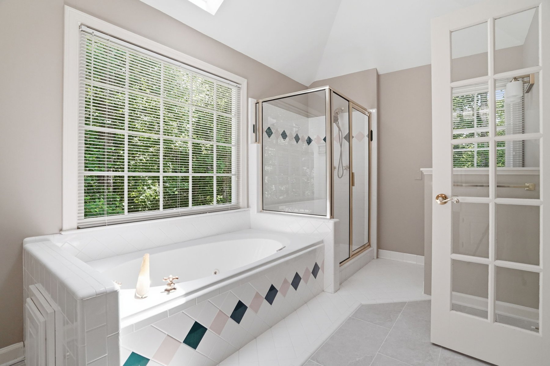 Bathroom with glass shower enclosure